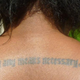Illustration for article titled Why She Got a Tat of Malcolm X’s ‘By Any Means Necessary’ at Age 20